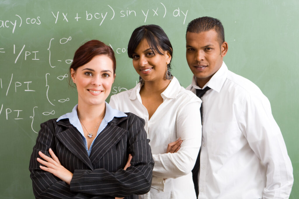 Teacher coworkers smiling