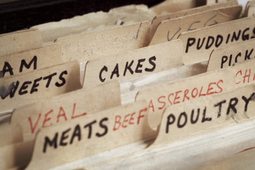 Old family recipe box, with sections for cakes, meats, etc. 