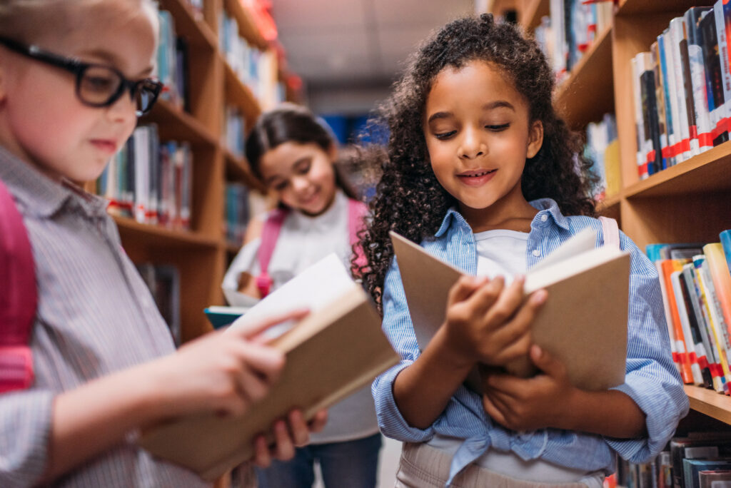 kids reading books in the local library
