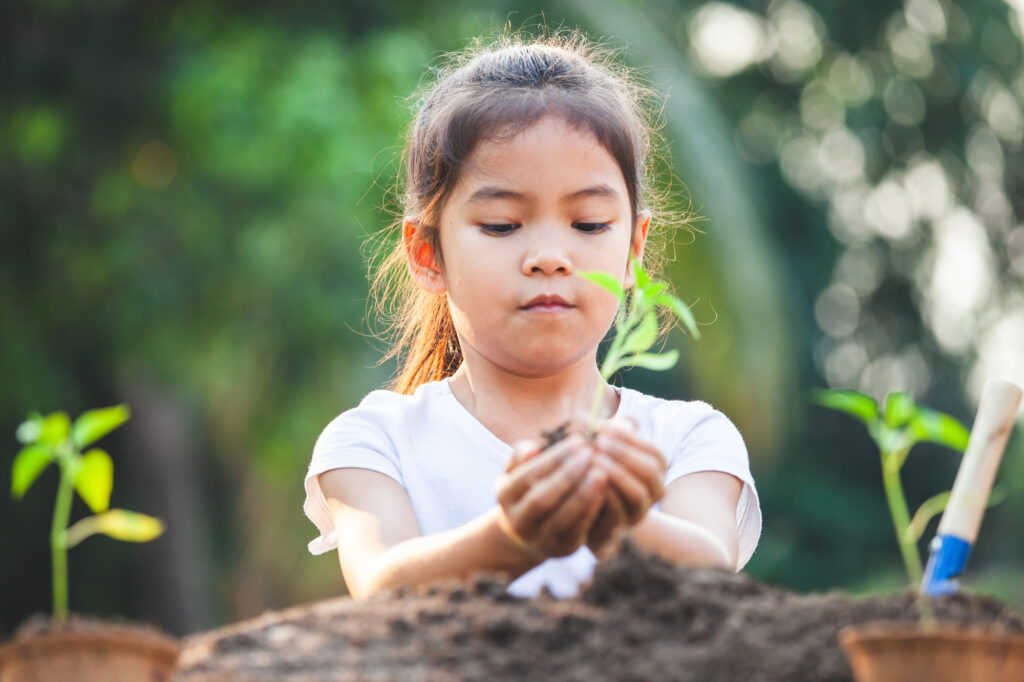 botanical garden field trip girl working with plants