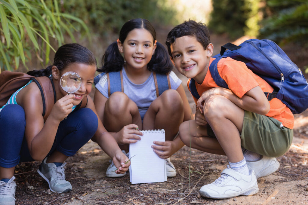 students exploring nature at botanical garden as part of way to prevent summer learning loss