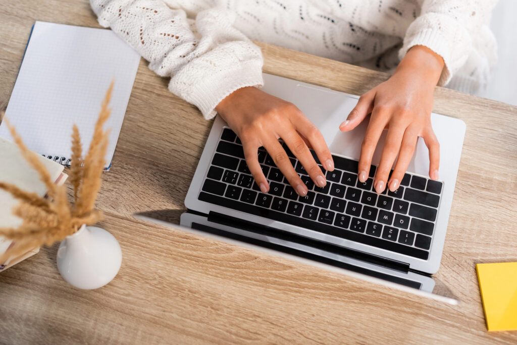 adult using computer to help with reading struggles